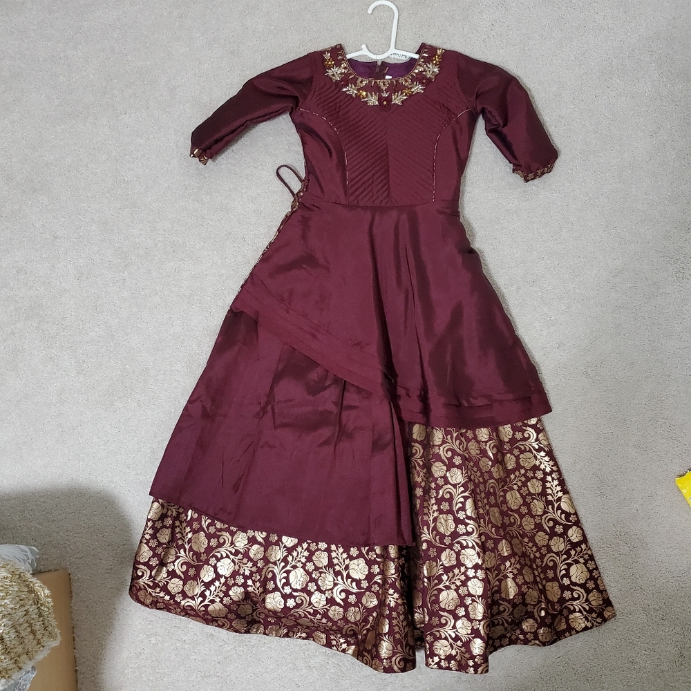 Deep maroon and gold dress
